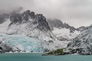 Fjord Prints: Views of snowstorm over Larsen Harbour in Drygalski Fjord on South Georgia Island during winter months in the Southern