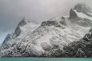 Fjord Prints: Views of snowstorm in Larsen Harbour with mountains and sea in Drygalski Fjord on South Georgia Island