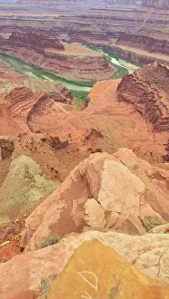 Canyonlands Prints: Views of twists and turns in a canyon under the bright sky at Canyonlands National Park in Utah with a river below
