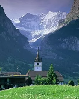 Switzerland Gallery: Village church and Oberer Grindelwald Glacier