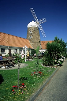 Jersey Prints: Village pub and windmill, St. Mary, Jersey, Channel Islands, United Kingdom, Europe