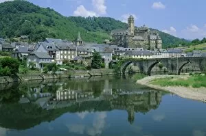 River Bank Collection: Village reflected in the Lot River, Estaing, Aveyron, Midi Pyrenees, France, Europe