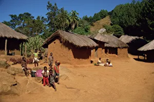Children Prints: Village scene, children in foreground, Zomba Plateau, Malawi, Africa