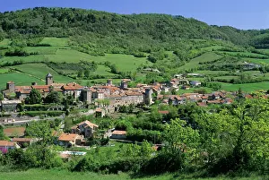 Aveyron Prints: Village viewpoint with green hills in daytime, Sainte-Eulalie-de-Cernon in Aveyron, France
