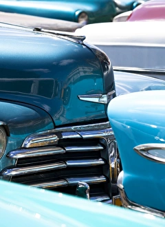 Vintage Car Prints: Vintage American cars parked on a street in Havana Centro