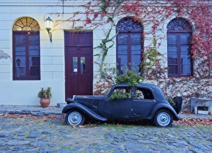 Rural Roads Prints: Vintage car on the cobblestone lane of the historic quarter, Colonia del Sacramento