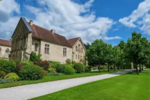 Visitors Prints: Visit to Abbey of Fontenay in France showcases historic architecture and lush gardens on a sunny day