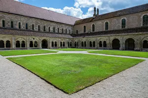 Columns Prints: Visit to Abbey of Fontenay with its green courtyard and historical architecture in France