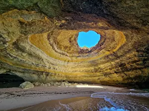 Geological Prints: Visit to Algar de Benagil cave reveals its unique rock formations and bright blue sky