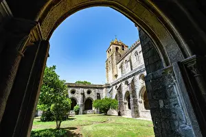 Courtyard Prints: Visit to Cathedral of Vora with view of courtyard and tower on a bright day in Portugal