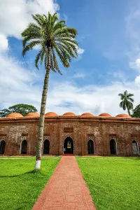 Pathway Prints: Visit to Sixty Dome Mosque in Bangladesh with palm trees and clear sky