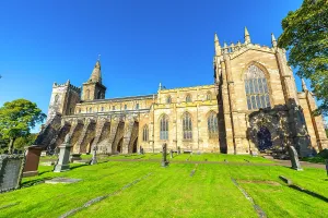 Windows Prints: Visit to Dunfermline Abbey with detailed architecture and surrounding graveyard during a sunny day in Fife
