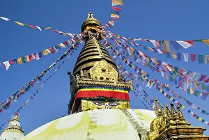 Meditation Prints: Visit to the historic Swayambhunath Stupa in Kathmandu showcasing its architecture and colorful prayer flags