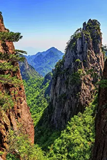 Province Prints: Visit Mount Huangshan in Anhui Province for breathtaking views and rich natural beauty of ancient peaks