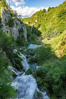 Waterfalls Prints: Visit natural beauty at Plitvice Lakes National Park with waterfalls and clear water in Croatia