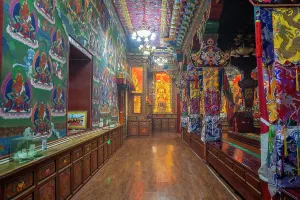 Meditation Prints: Visit to Songzanlin Monastery hall in Shangri-La City shows traditional Tibetan Buddhist art