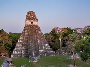 Pyramid Prints: Visiting Temple I at dusk with a view from above in Tikal, Guatemala