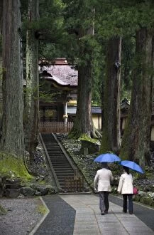 Visitors at Chokushimon Imperial Gate at Eiheiji Temple, headquarters of the Soto sect of Zen Buddhism, in