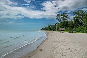 Swimming Prints: Visitors enjoy Casuarina beach on a sunny day in Jaffna district