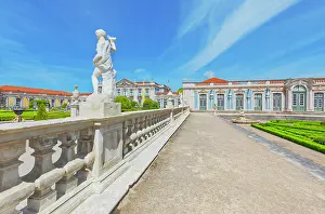 Landscaping Prints: Visitors explore the gardens and architecture of Queluz National Palace while enjoying a sunny day in Lisbon