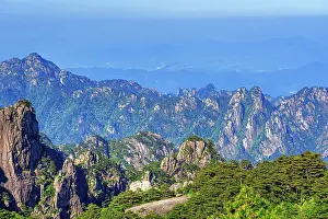 Days Prints: Visitors explore the peaks of Huangshan during a clear day in Anhui Province, China