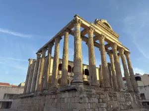 Monumental Prints: Visitors look at the Roman Temple to Diana in Merida