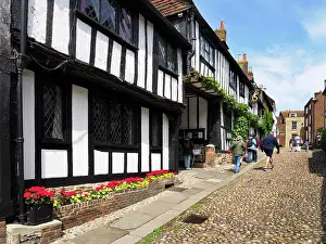 Pictures Prints: Visitors stroll along the cobbled street to explore historical buildings in Rye