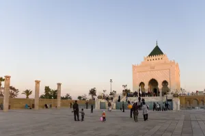 Images Dated 2nd April 2009: Visitors walk amongst the columns at The Unfinished Hassan Mosque, and the Mausoleum of Mohammed V