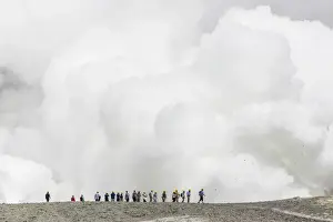 Guided Tour Prints: Visitors watching mud being ejected from the caldera floor of an active andesite stratovolcano on White Island