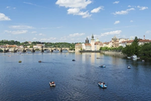 Pedalo Prints: Vltava River and Charles Bridge on a sunny spring day, Prague, Czech Republic, Europe