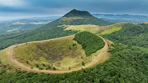 Ecology Prints: Volcanic domes rise above green fields in the Chaine de Puys