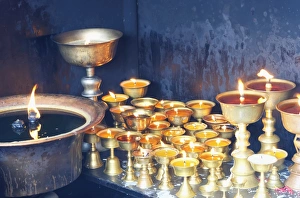 Religious Offering Prints: Votive candles, Boudhanath Stupa, UNESCO World Heritage Site, Kathmandu, Nepal, Asia