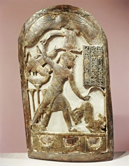 Hunter Prints: Votive shield showing the king slaying two lions, from the tomb of the pharaoh Tutankhamun