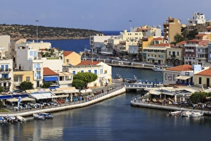 Agios Nikolaos Prints: Voulismeni Lake, lined with cafes and restaurants, bridge crosses a narrow channel