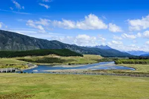 Waiau river and the southern alps along the road from Invercargill to Te Anau, South Island, New Zealand, Pacific