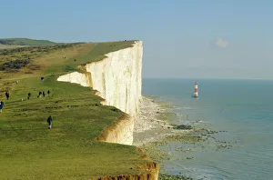 Walkers on cliff top, Beachy Head, Sussex, England, UK