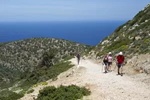 Images Dated 23rd April 2008: Walkers on coastal walk, Akrotiri Peninsula, Chania region, Crete, Greek Islands, Greece, Europe