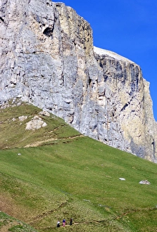 Rock Cliff Prints: Walkers on trail above Sella Pass