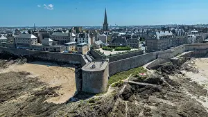 Attractions Prints: Walled city of Saint-Malo with historic buildings and coastline in Brittany France under clear sky