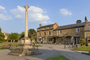 War Memorial Prints: War Memorial stone cross on the High Street in the village of Broadway