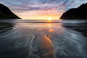 Senja Prints: Warm lights of sunset reflecting on sand at Ersfjord beach, Senja island, Troms county