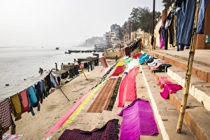 Laundry Prints: Washing drying on ghats next to the River Ganges, Varanasi, Uttar Pradesh, India, Asia