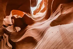 Water eroded Navajo Sandstone forms a slot canyon in Upper Antelope Canyon, Navajo Land
