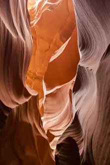Water eroded Navajo Sandstone forms a slot canyon in Upper Antelope Canyon, Navajo Land