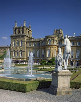 Water fountain and statue in the garden in front of Blenheim Palace, Oxfordshire