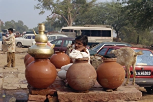 Collecting Prints: Water pots by the road