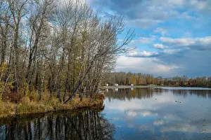 Parks Prints: Water reflects trees in Kyzyl national park in Russia during autumn