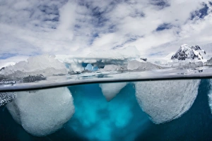 Surface Level View Prints: Above and below water view of Danco Island, Errera Channel, Antarctica, Polar Regions