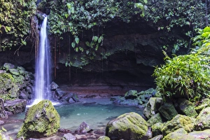 Waterfall splashing in the Emerald Pool in Dominica, West Indies, Caribbean, Central America