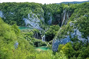Waterfalls Prints: Waterfalls and lakes flow through green forests in an outdoor setting in Croatia's national park